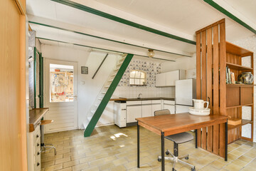 Bright and airy kitchen featuring a modern design, wooden furniture, and ample natural light, ideal...