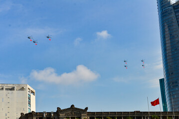 Helicopter Parade Over Saigon Skyline on Vietnam Reunification Day

