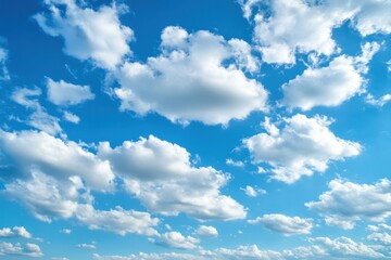 Naklejka premium Bright azure sky adorned with soft clouds for tranquil nature scenes and peaceful backgrounds