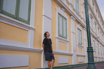 solo travel with man chilling see city life in bangkok thailand in summer season