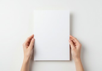 Woman's Hands Holding a Blank White Paper Sheet Mockup for Design