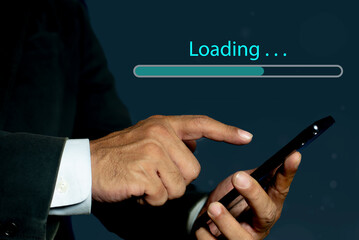 Businessman hand using mobile smartphone for downloading application or digital business data form website and cloud to smartphone
