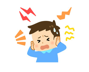 うるさくて耳を塞いでいる男の子