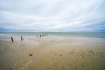 Beach landscape on Rømø. The Danish Wadden Sea island of Rem. Minimalist nature on the expansive beach.
