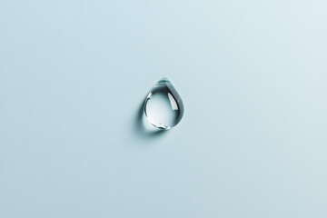 Drop droplet of water isolated on blue background