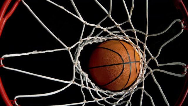 Super Slow Motion of Basketball Ball Going Through Hoop Net at 1000fps.