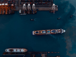 luxury transportation, large cruise ship docked at pier in dark sea backgrounds, cinematic process...