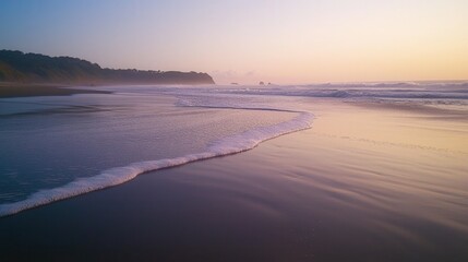 Obraz premium Serene coastal scene at dawn, with soft hues of sunrise.