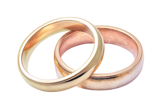 Two simple gold wedding bands overlapping each other on a grey background transparent background - Powered by Adobe