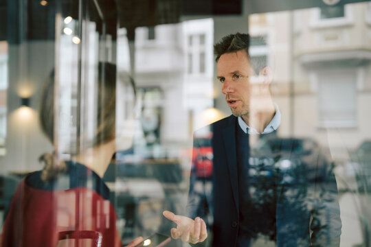 Business discussion in a caf� with a focus on communication and teamwork