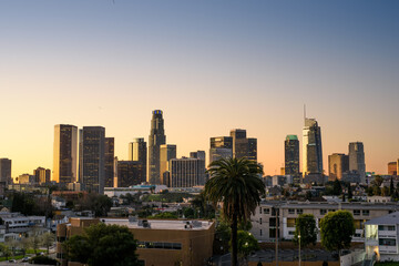 Naklejka premium Downtown Los Angeles skyline at sunset