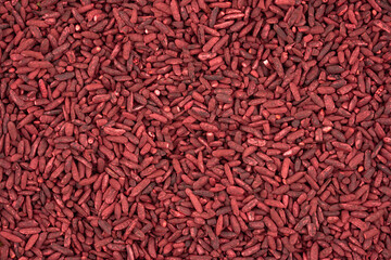 top view flat lay ferment red yeast rice or Angkak food background texture