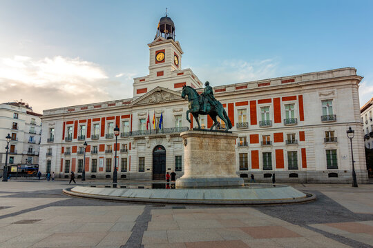 Post office building and statue of king Charles III on Puerta del Sol square, Madrid, Spain
