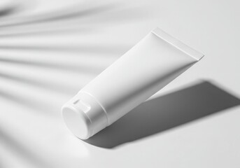 White Cosmetic Tube Mockup on White Background with Palm Leaf Shadow