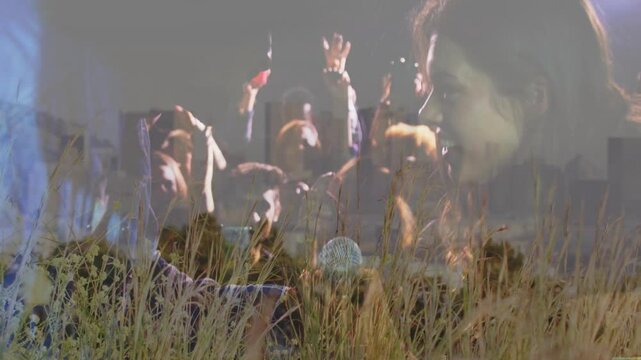 Singer and bandmates performing music in field, featuring mic and grasses overlaid on city skyline