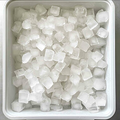 top down shot of a lot of refreshing ice cubes in a cooler