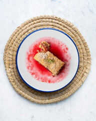Delicious homemade raspberry crumble tart. Top view table.
