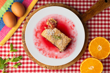 Delicious homemade raspberry crumble tart. Top view table.
