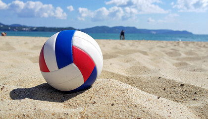 Obraz premium A volleyball game ready to take place on the beach with beautiful weather and sand