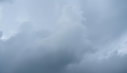 Fototapeta premium plane flying through a cloudy sky on a cloudy day