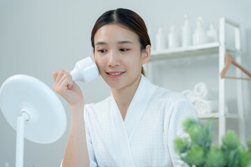 beautiful Asian women use tools to tighten their pores. Healthy faces. Facial care and treatment....