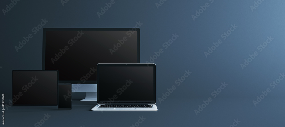 Aufkleber Digital device mockup with desktop, laptop, tablet, and smartphone on dark background for modern tech product presentation template layout. 3D Rendering