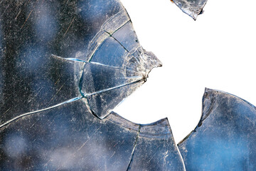 Broken glass on white background. Shattered glass shards, broken window, isolated on white background, sharp, broken, cracks on glass. Broken glass texture, isolated cracks on white background.