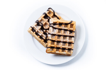 Belgian Waffles with chocolate isolated on white background. Top view