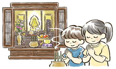 線香を焚き仏壇に向かって合掌する子どもたち