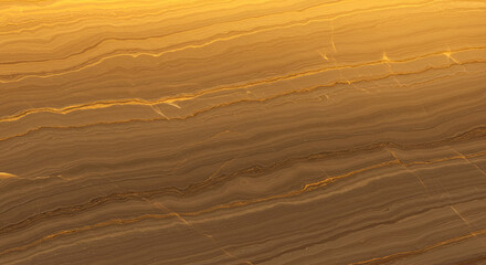 Fototapeta premium Warm, golden-brown stone texture with intricate veining