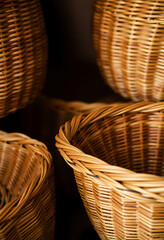 three wicker baskets sitting next to each other