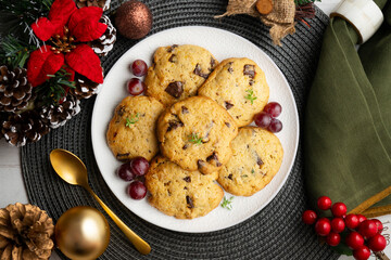 Handmade chocolate chip cookies. Top view table with christmas decorations.