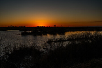 Obraz premium sunset over the river