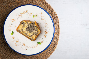 Delicious lemon and poppy seed cake. Top view table.