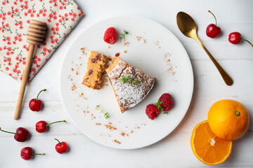 Whole wheat vegan cake with fresh fruit. Top view table.
