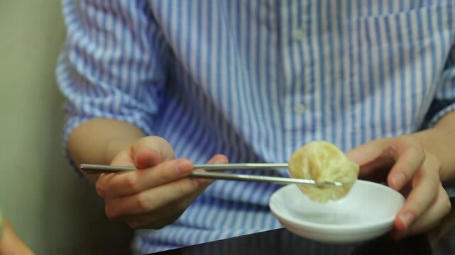 Steamed mandu on a white plate