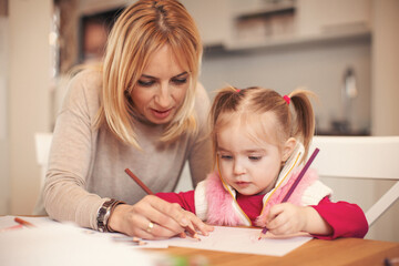 Family at home. Shallow DOF. Developed from RAW; retouched with special care and attention; Small...