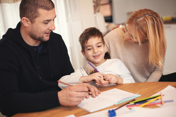 Family at home. Shallow DOF. Developed from RAW; retouched with special care and attention; Small...