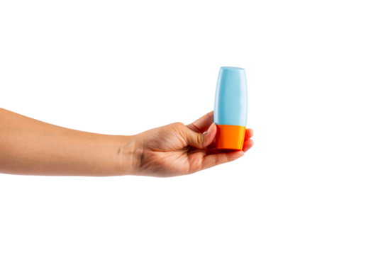 Blue cosmetic bottle in hand, Skin care or sunscreen cosmetic on transparent background.