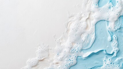 Naklejka premium Abstract Background with Light Blue Paint and White Foam abstract background texture surface white