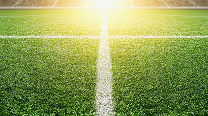 Obraz premium A bright soccer field bathed in sunshine with lush green grass creating a perfect setting for outdoor activities and sports