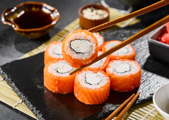 Philadelphia luxe roll with salmon and cream cheese, vibrant lighting, minimalist composition