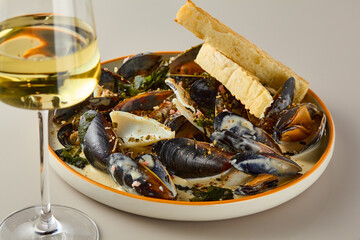 Elegant Mussels in Cream Sauce with Wine Sophisticated Culinary Presentation in Soft Lighting