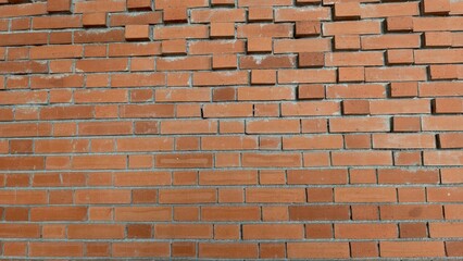 Textured Brick Wall with Imperfections and Gaps