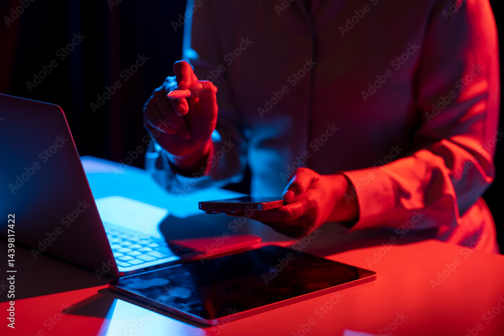 Poster businesswoman holding a cellphone while touching or pointing at something with a marker. laptop comp