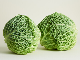 Savoy cabbage over beige background