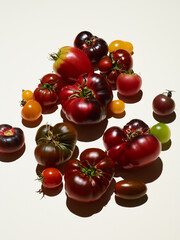 Sweet farm tomatoes over beige background