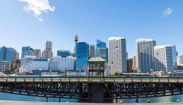 The Pyrmont Bridge when open to tall vessels, Cockle Bay. Sydney skyline in the background