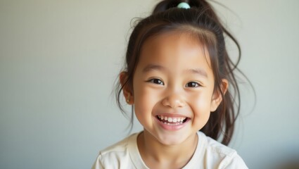 Radiant Joy: A Captivating Portrait of a Cheerful Young Girl's Innocence