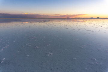 Salar de Uyuni in Bolivia with Water Layer Creating a Perfect Reflection of the Sky, A Surreal and Iconic Landscape of the Altiplano Region